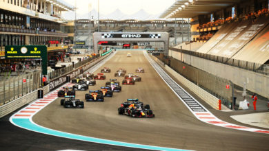 ABU DHABI, UNITED ARAB EMIRATES - DECEMBER 13: Max Verstappen of the Netherlands driving the (33) Aston Martin Red Bull Racing RB16 leads Lewis Hamilton of Great Britain driving the (44) Mercedes AMG Petronas F1 Team Mercedes W11 and Valtteri Bottas of Finland driving the (77) Mercedes AMG Petronas F1 Team Mercedes W11 into turn one at the start during the F1 Grand Prix of Abu Dhabi at Yas Marina Circuit on December 13, 2020 in Abu Dhabi, United Arab Emirates. (Photo by Bryn Lennon/Getty Images) // Getty Images / Red Bull Content Pool // SI202012130392 // Usage for editorial use only //