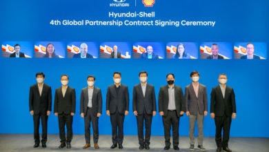 1 Photo at the event (4th from left, Un Soo Kim, EVP)