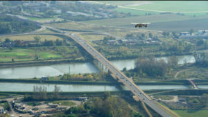 3 _2021_AeroMobil_Test_Flights_stills_Flying_over_bridge