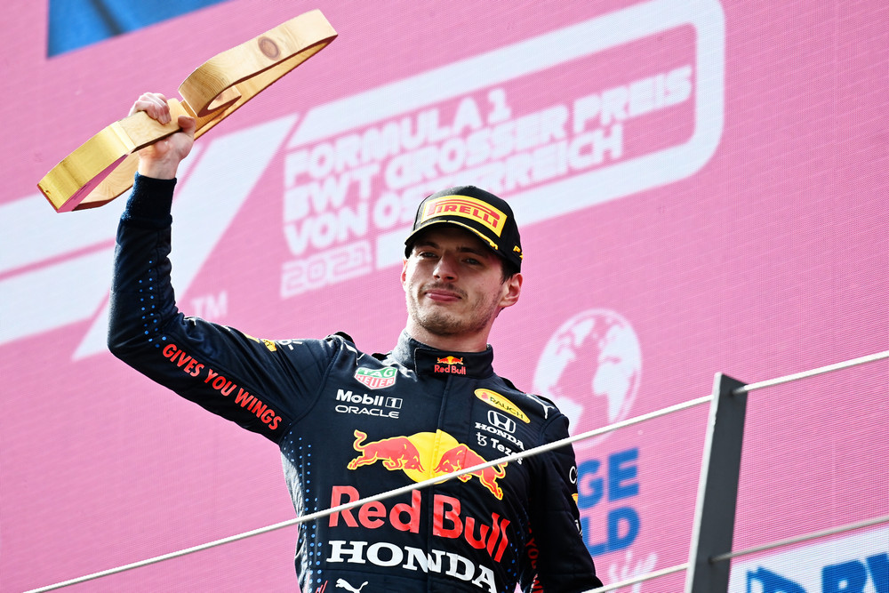 SPIELBERG, AUSTRIA - JULY 04: Race winner Max Verstappen of Netherlands and Red Bull Racing celebrates on the podium during the F1 Grand Prix of Austria at Red Bull Ring on July 04, 2021 in Spielberg, Austria. (Photo by Christian Bruna - Pool/Getty Images) // Getty Images / Red Bull Content Pool // SI202107040278 // Usage for editorial use only //
