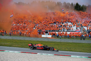 SPIELBERG, AUSTRIA - JULY 04: Race winner Max Verstappen of the Netherlands driving the (33) Red Bull Racing RB16B Honda past a grandstand full of his fans celebrating during the F1 Grand Prix of Austria at Red Bull Ring on July 04, 2021 in Spielberg, Austria. (Photo by Getty Images/Getty Images) // Getty Images / Red Bull Content Pool // SI202107040291 // Usage for editorial use only //