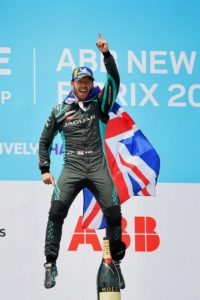 BROOKLYN STREET CIRCUIT, UNITED STATES OF AMERICA - JULY 11: Sam Bird (GBR), Jaguar Racing, 1st position, celebrates on the podium during the New York City E-Prix II at Brooklyn Street Circuit on Sunday July 11, 2021 in New York City, United States of America. (Photo by Simon Galloway / LAT Images)