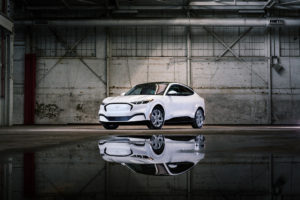 Available Ice White Appearance Package on appropriately configured 2022 Mustang Mach-E and Mustang Coupe models. Closed course.