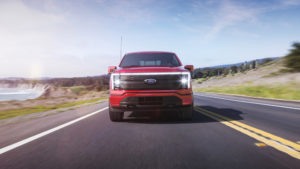 2022 Ford F-150 Lightning Lariat. Pre-production model with available features shown. Available starting spring 2022.