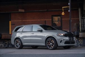 2022 Dodge Durango SRT 392: Equipped with the 392-cubic-inch HEMI V-8 delivering 475 horsepower and 470 lb.-ft. of torque, the Durango SRT 392 features aggressive exterior styling and a driver-centric cockpit, shown here in Destroyer Grey with Dual Low Gloss Gunmetal stripes.