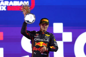 JEDDAH, SAUDI ARABIA - MARCH 27: Race winner Max Verstappen of the Netherlands and Oracle Red Bull Racing celebrates on the podium during the F1 Grand Prix of Saudi Arabia at the Jeddah Corniche Circuit on March 27, 2022 in Jeddah, Saudi Arabia. (Photo by Lars Baron/Getty Images) // Getty Images / Red Bull Content Pool // SI202203270587 // Usage for editorial use only //