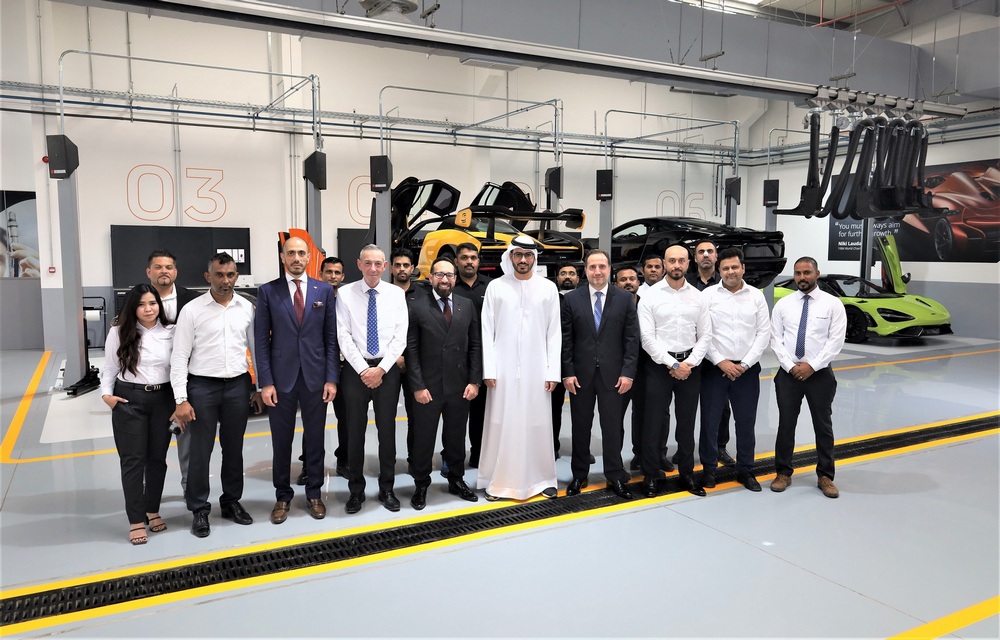 1 McLaren Service Centre Board Member Juma Khalifa Al Nabooda with the service centre team