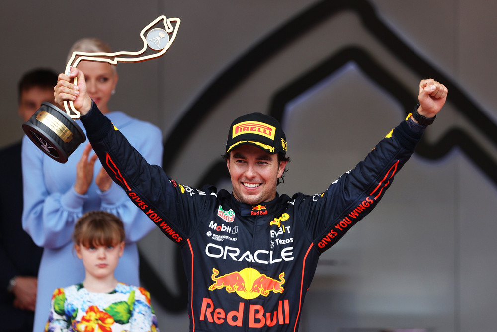 MONTE-CARLO, MONACO - MAY 29: Race winner Sergio Perez of Mexico and Oracle Red Bull Racing celebrates on the podium during the F1 Grand Prix of Monaco at Circuit de Monaco on May 29, 2022 in Monte-Carlo, Monaco. (Photo by Clive Rose/Getty Images) // Getty Images / Red Bull Content Pool // SI202205290486 // Usage for editorial use only //