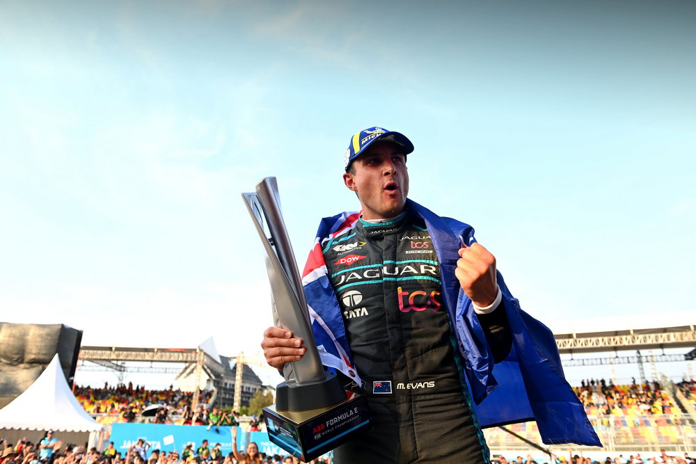 JAKARTA STREET CIRCUIT, INDONESIA - JUNE 04: Mitch Evans (NZL), Jaguar TCS Racing , 1st position, Podium during the Jakarta ePrix at Jakarta Street Circuit on Saturday June 04, 2022 in Jakarta, Indonesia. (Photo by Sam Bagnall / LAT Images)