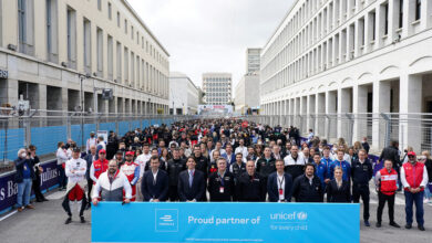A Unicef group photo on the grid in Rome, including Alejandro Agag, Jamie Reigle, Alberto Longo, Julia Palle