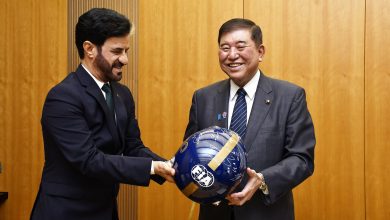 1. FIA President Mohammed Ben Sulayem presents Japanese Prime Minister Shigeru Ishiba with a commemorative FIA race helmet signed by all of last