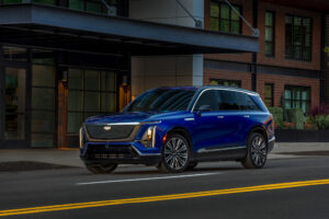 Front 3/4 view of the 2026 Cadillac VISTIQ Premium Luxury in Opulent Blue.