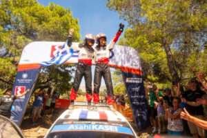 Sébastien Ogier (FRA) and Vincent Landais (FRA) of team TOYOTA GAZOO RACING WRT celebrate on the podium in first place after winning the WRC Rally1 category at EKO Acropolis Rally Greece in Loutraki, Greece on June 28, 2026. // Jaanus Ree / Red Bull Content Pool // SI202606280407 // Usage for editorial use only //