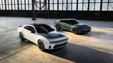 Gas-powered, 550-horsepower 2027 Dodge Charger Scat Pack models, shown in White Knuckle and Sub-Zero exterior colors. New custom options for the 2027 Dodge Charger include a Satin Black painted hood and orange Brembo brake calipers (both shown on White Knuckle Charger).