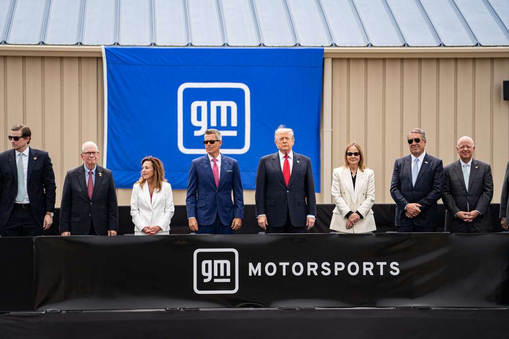 President Donald J. Trump views a drag race demonstration at GM's Milford Proving Grounds. Also featured L of President: U.S. Secretary of Transportation Sean Duffy. U.S. Representative Lisa McClain. U.S. Representative Tim Walberg. White House Political Director Matthew Brasseaux. R of President: GM Chair and CEO Mary Barra. GM President Mark Reuss. GM Executive Vice President and CFO, Paul Jacobson.